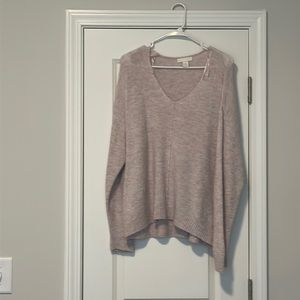 Pink sweater with hints of purple. Cashmere like material.